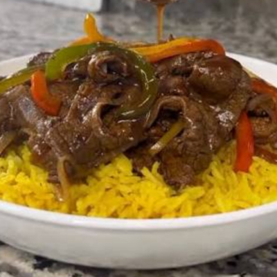 Pepper Steak over Yellow Rice